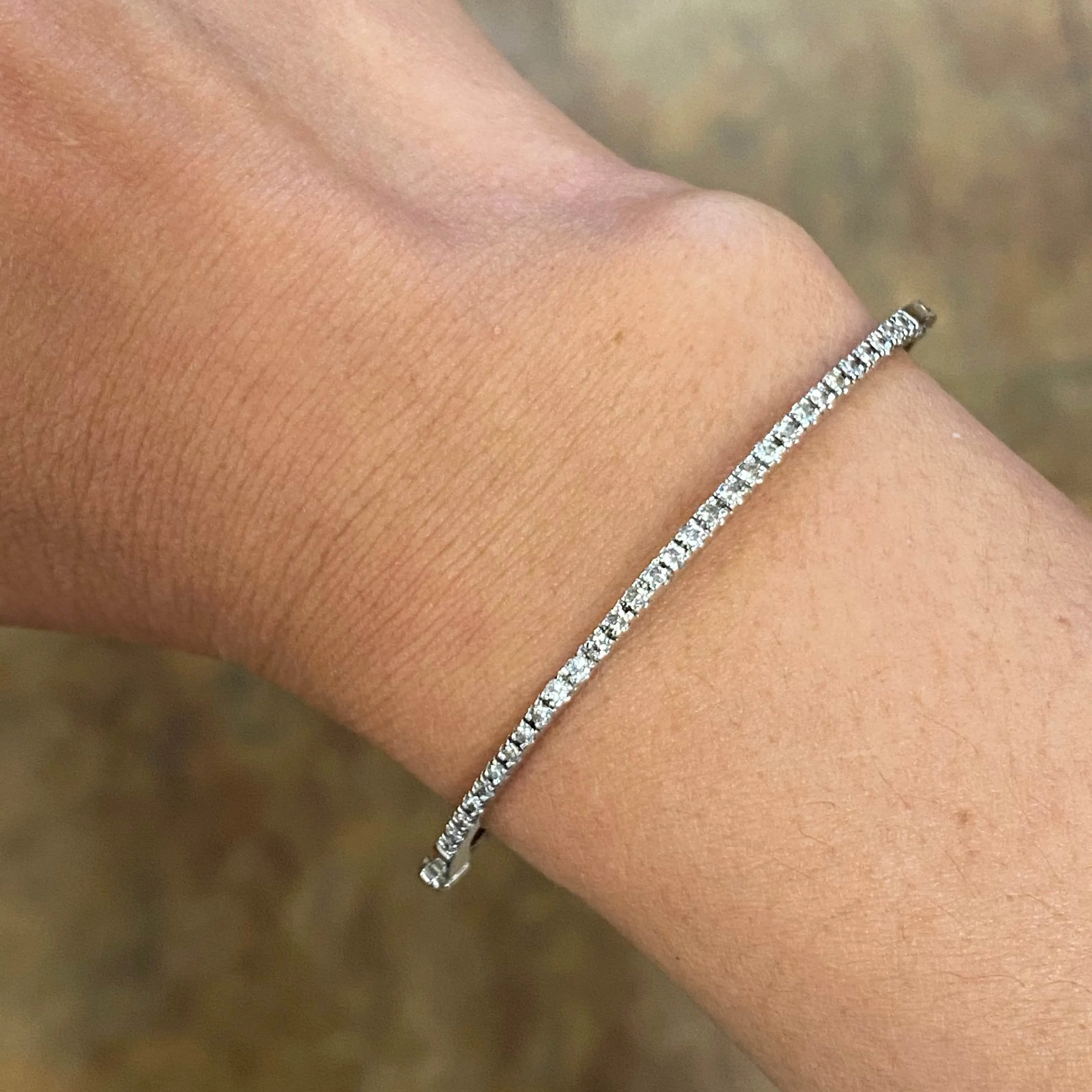 14K White Gold Diamond Thin Half Eternity Oval Bangle
