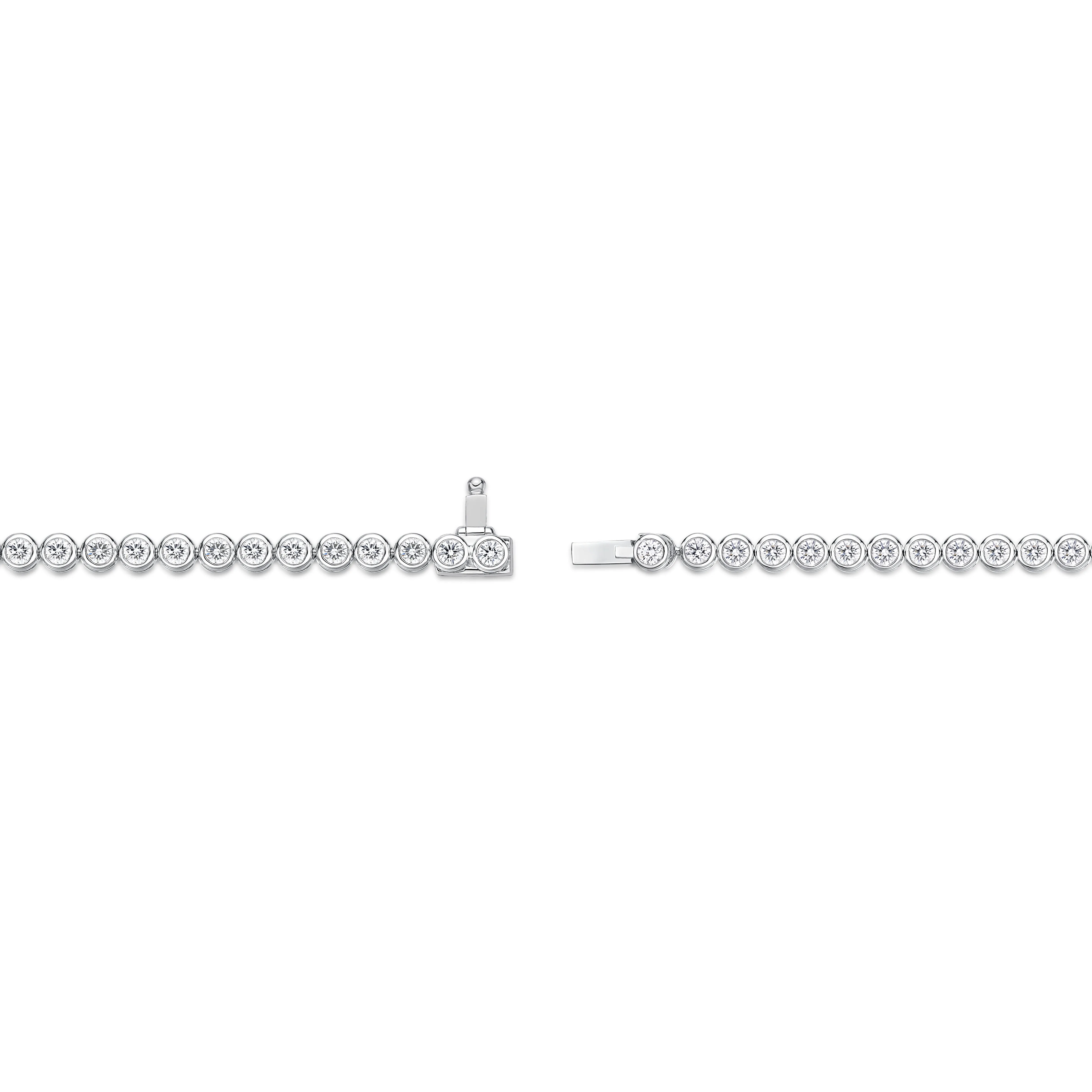 18K WHITE GOLD DIAMOND TENNIS BRACELET .90CT