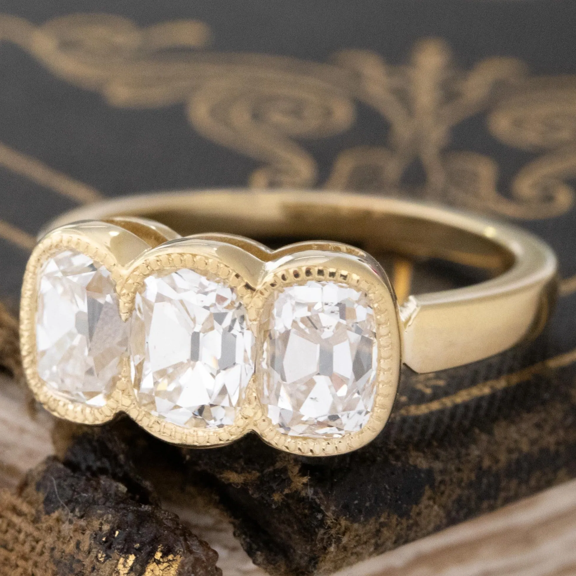 2.55ctw Elongated Old Mine Cut Diamond Trilogy Bezel Ring
