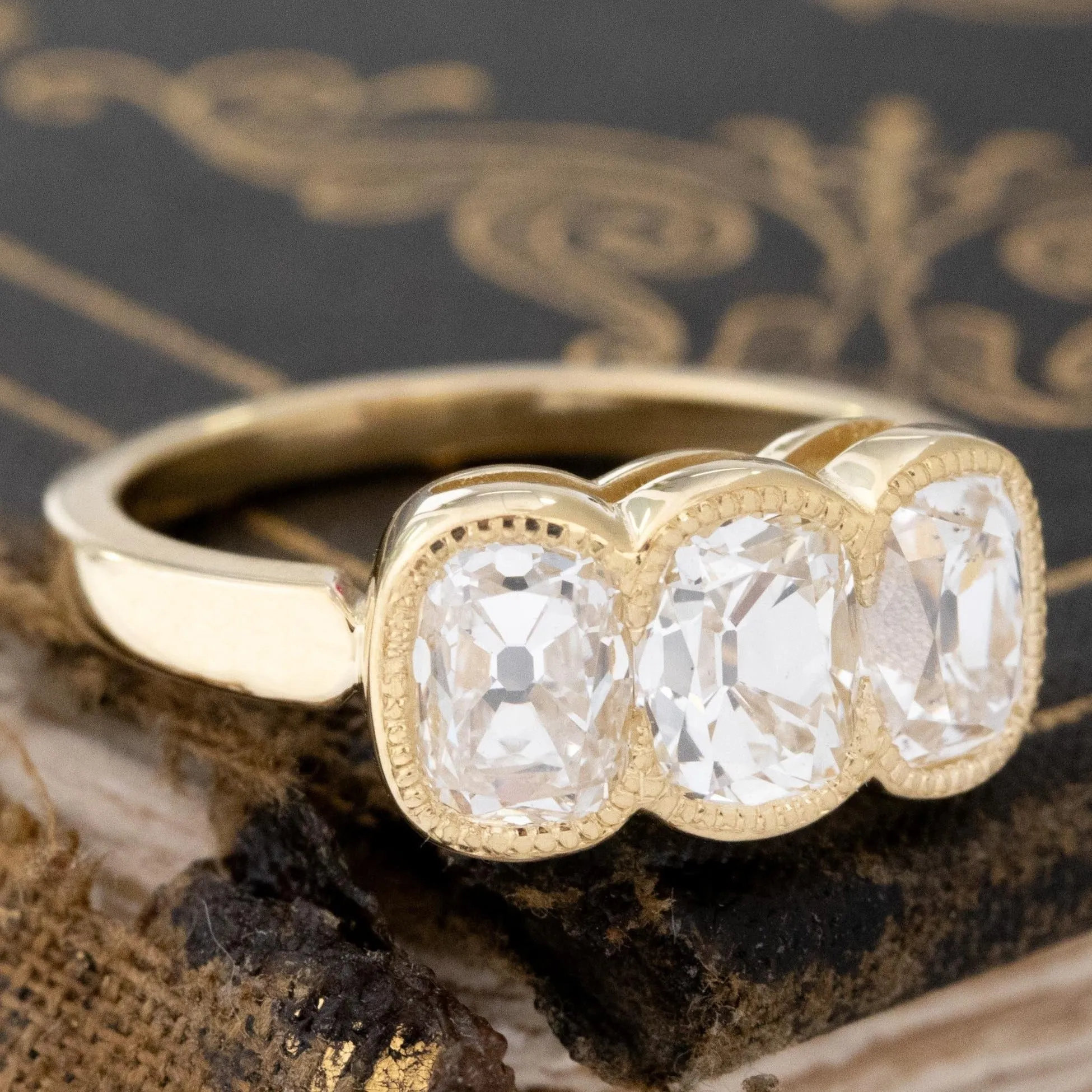2.55ctw Elongated Old Mine Cut Diamond Trilogy Bezel Ring
