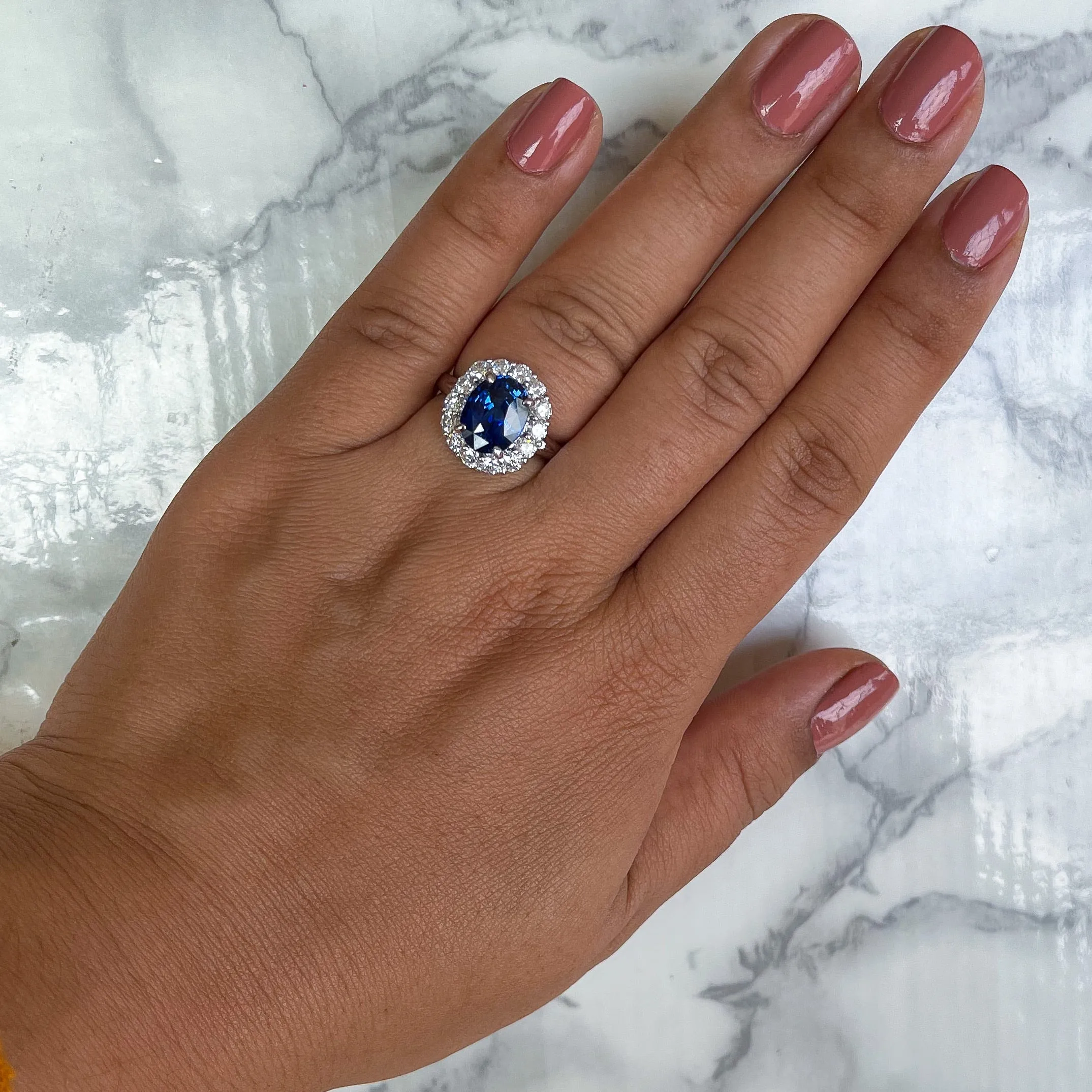 4.45ct. Oval Blue Sapphire GIA Certified Ring with Diamond Halo in 18K White Gold