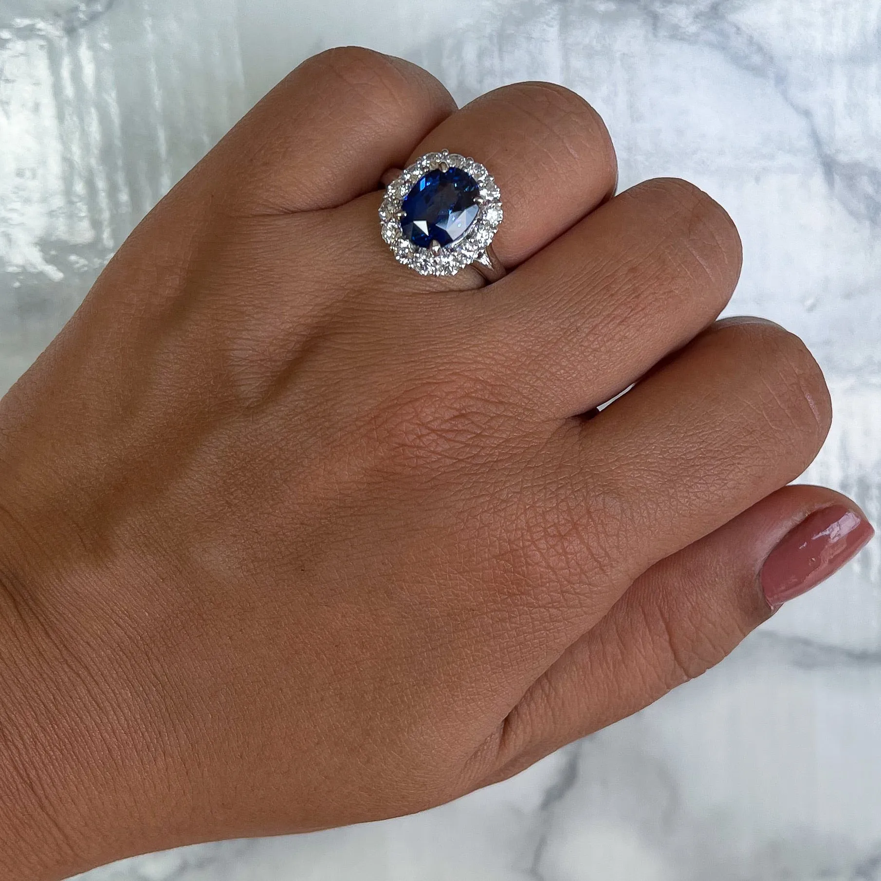 4.45ct. Oval Blue Sapphire GIA Certified Ring with Diamond Halo in 18K White Gold