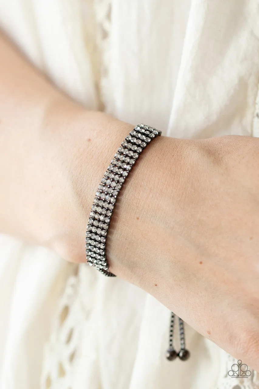 A DIAMOND a Dozen - Black - White Rhinestone Gunmetal Bolo Paparazzi Bracelet