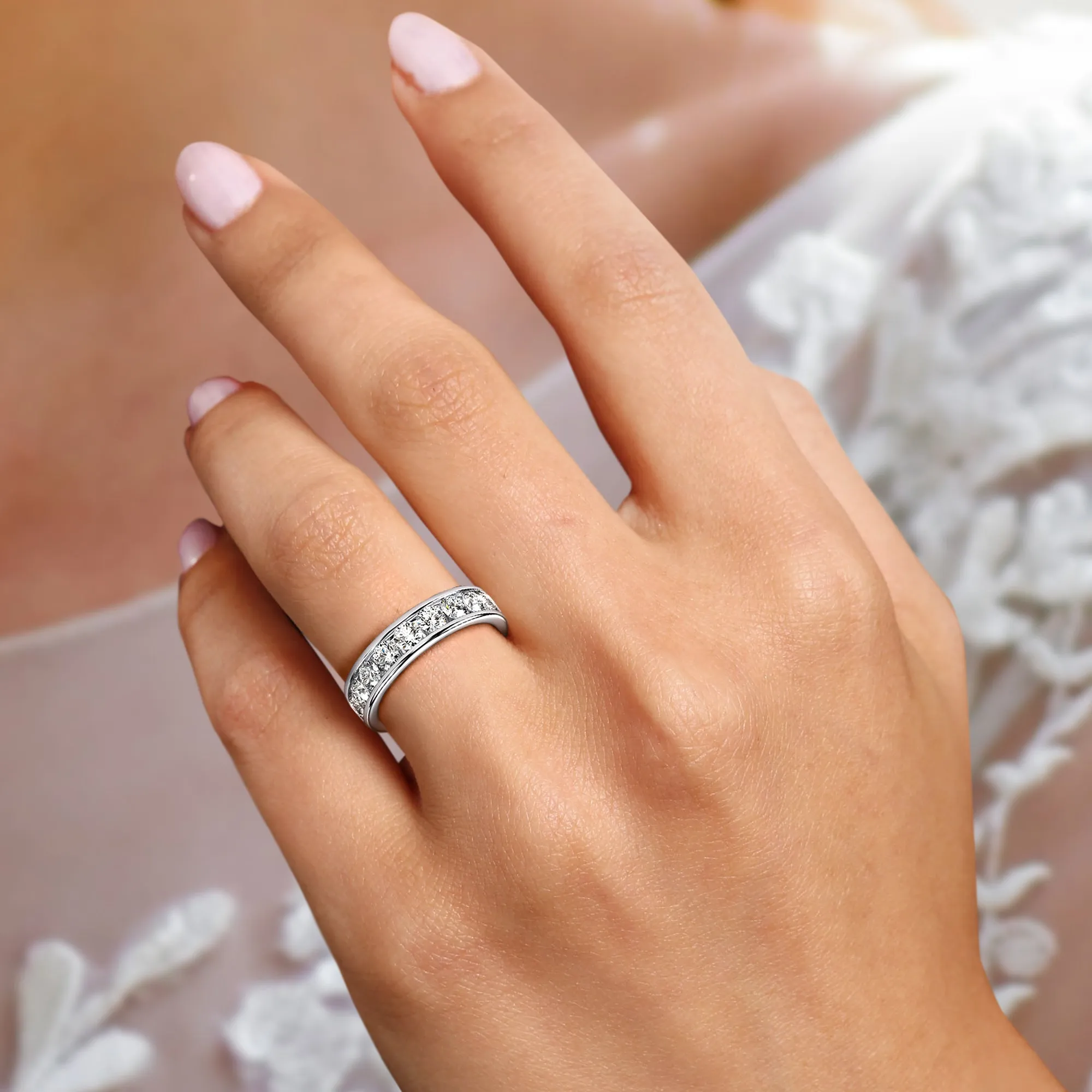 CAMY ROUND CHANNEL SET DIAMOND BAND