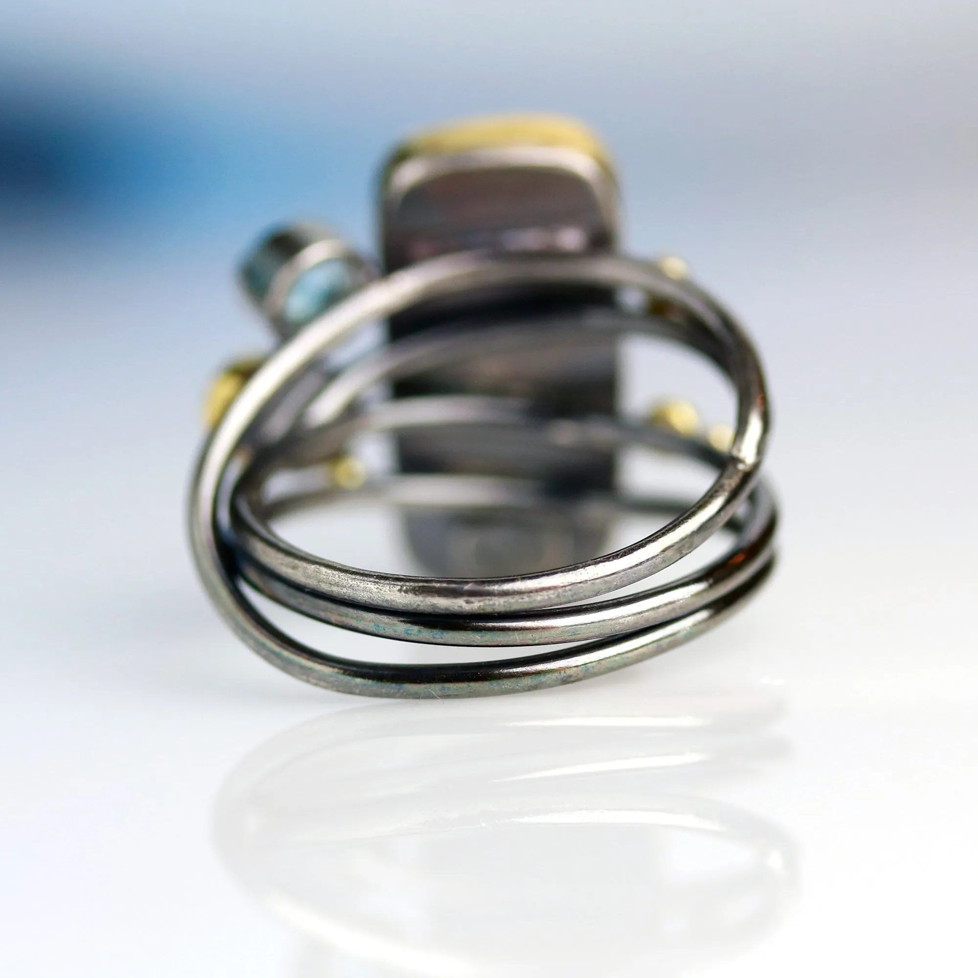 Labradorite, Kyanite and Blue Topaz on Swirled Band Ring. Size 7 1/2.