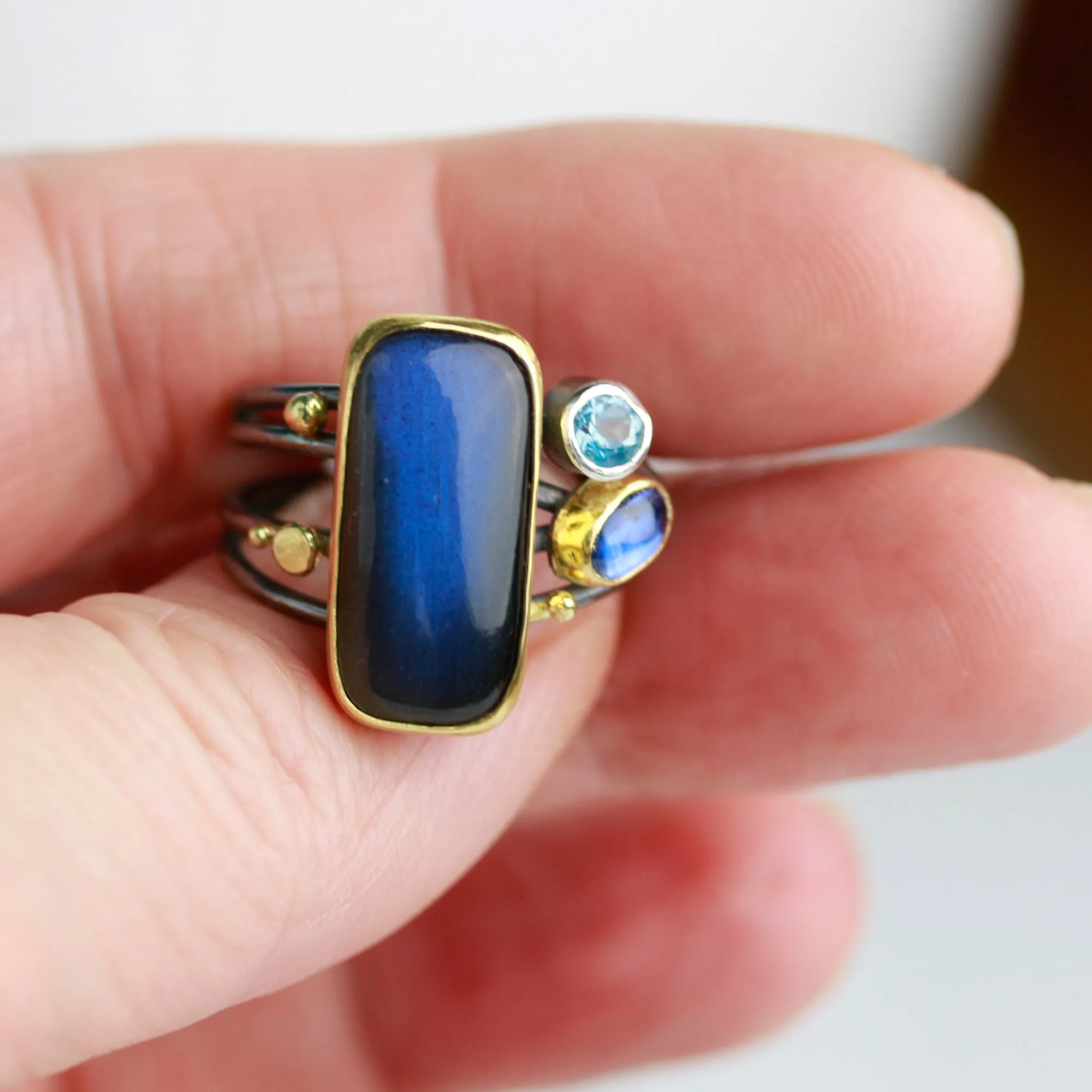 Labradorite, Kyanite and Blue Topaz on Swirled Band Ring. Size 7 1/2.