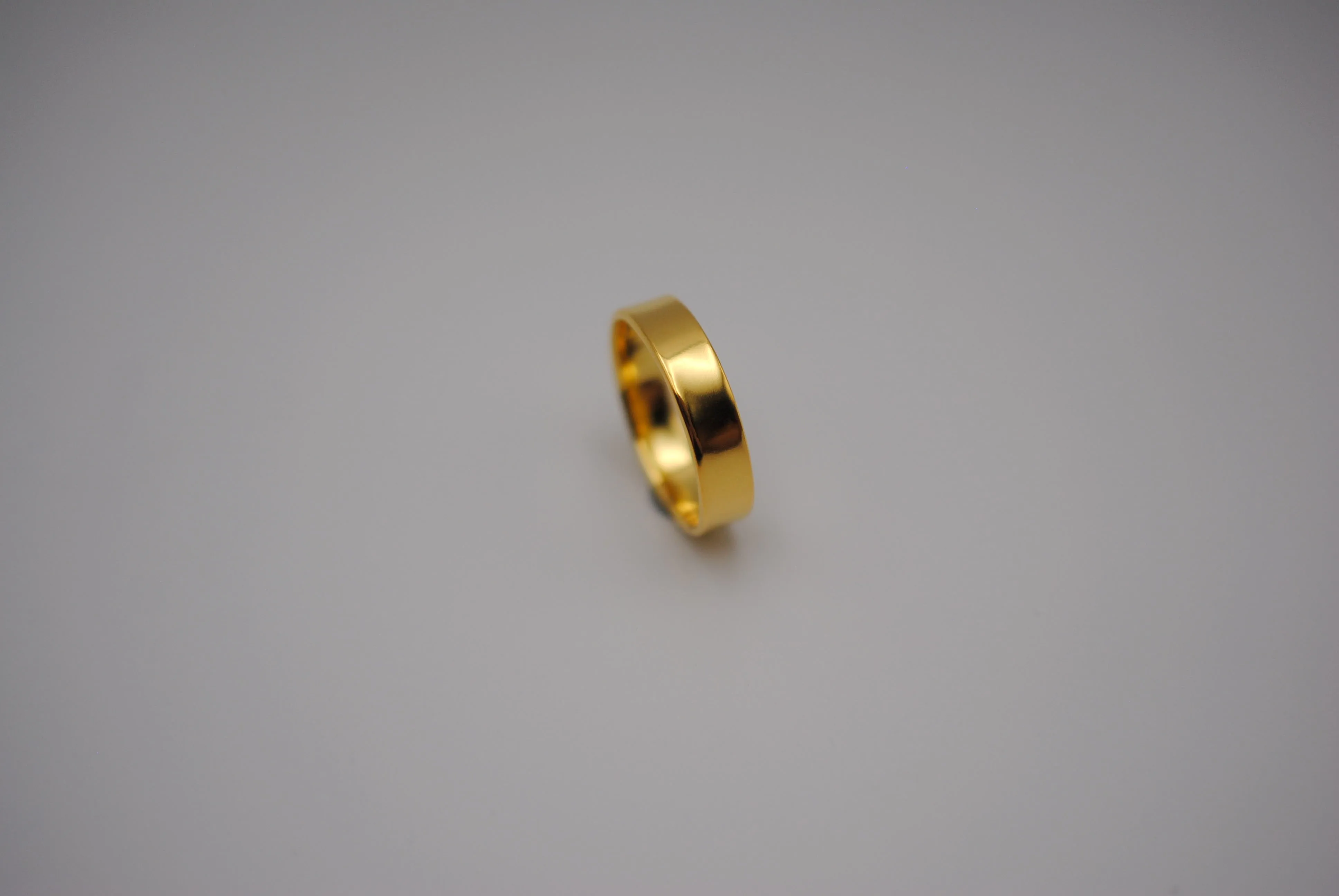 Ring Band: High Polish, Yellow Gold Finish, 5mm Wide