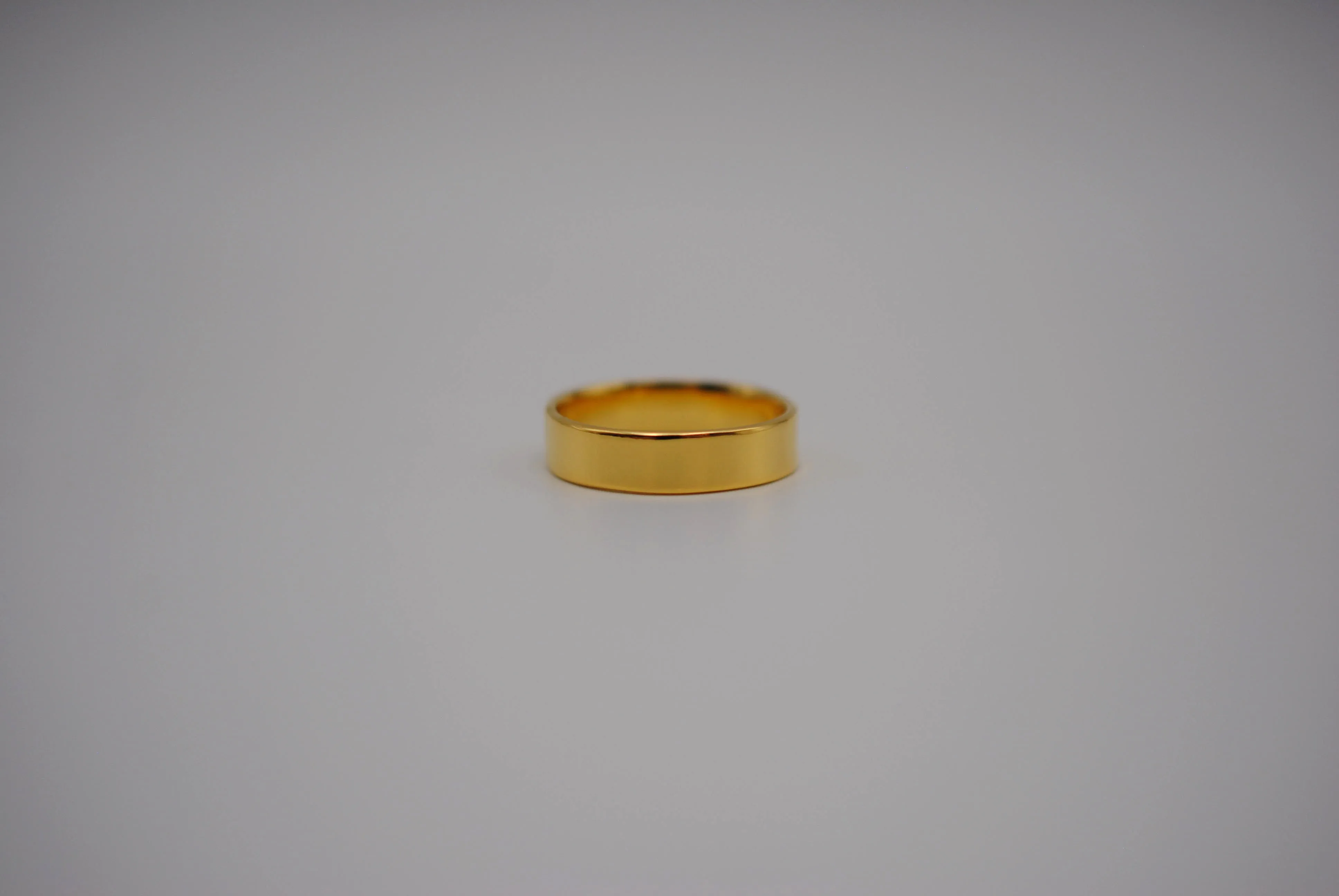 Ring Band: High Polish, Yellow Gold Finish, 5mm Wide