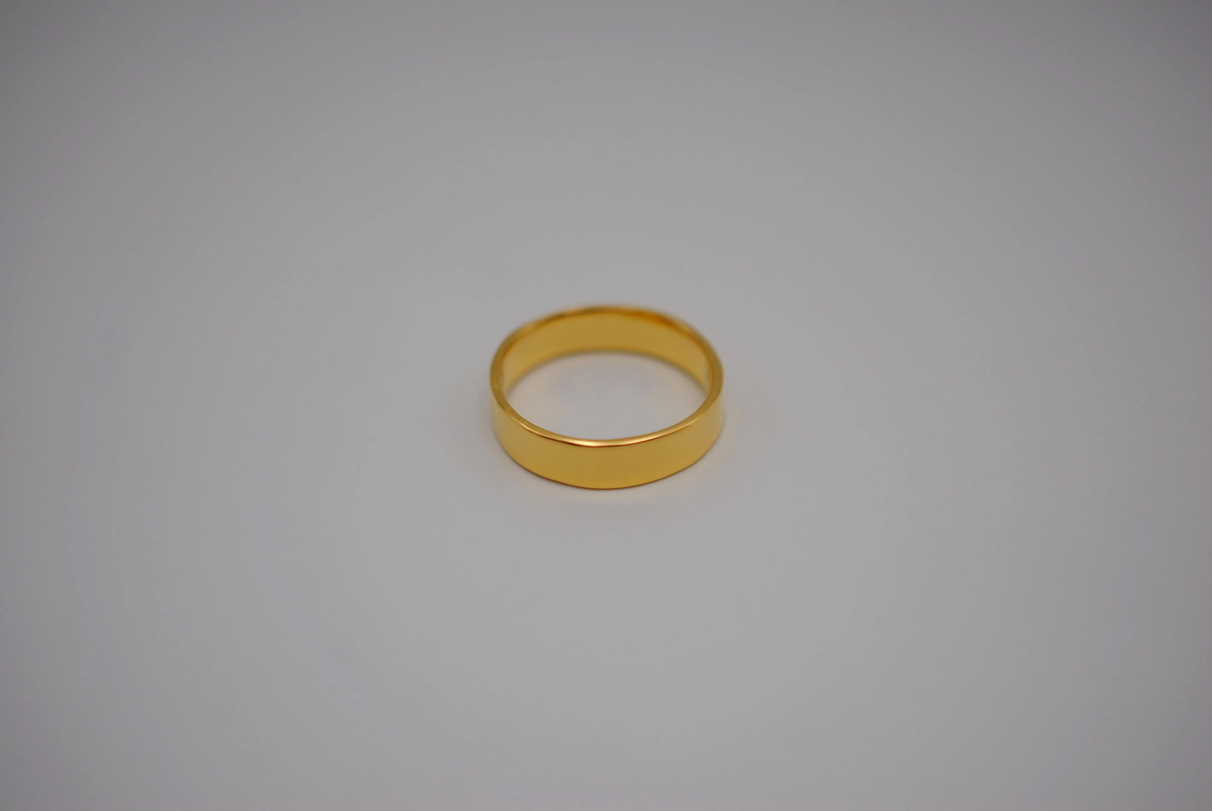 Ring Band: High Polish, Yellow Gold Finish, 5mm Wide