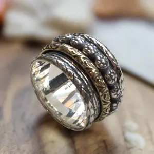Silver Brass Spinners Ring - Reunion.