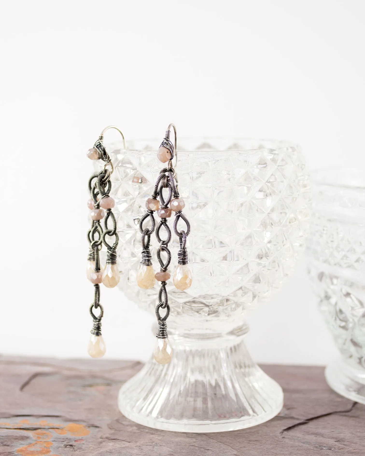 Silver dangle earrings with ivory and blush quartz