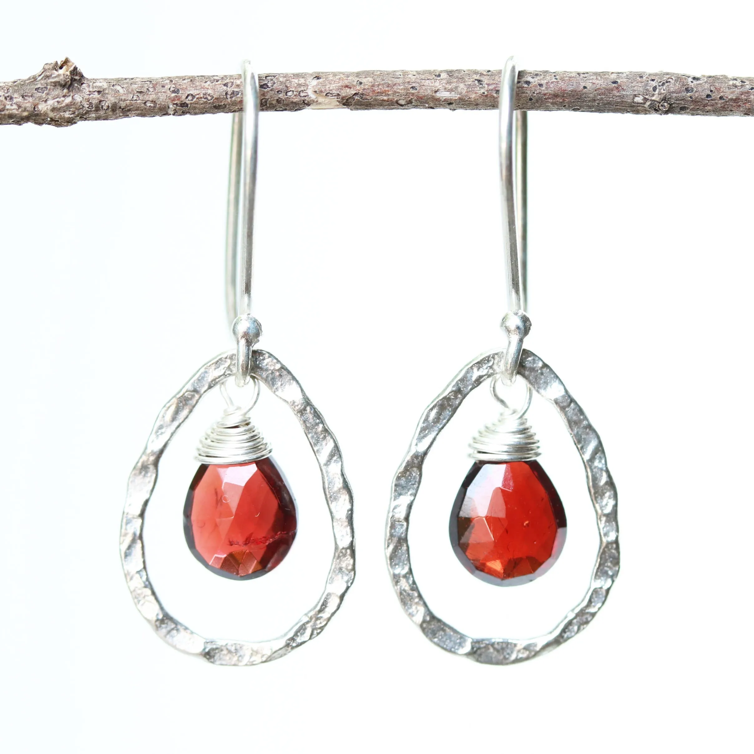 Silver drop earring with garnet