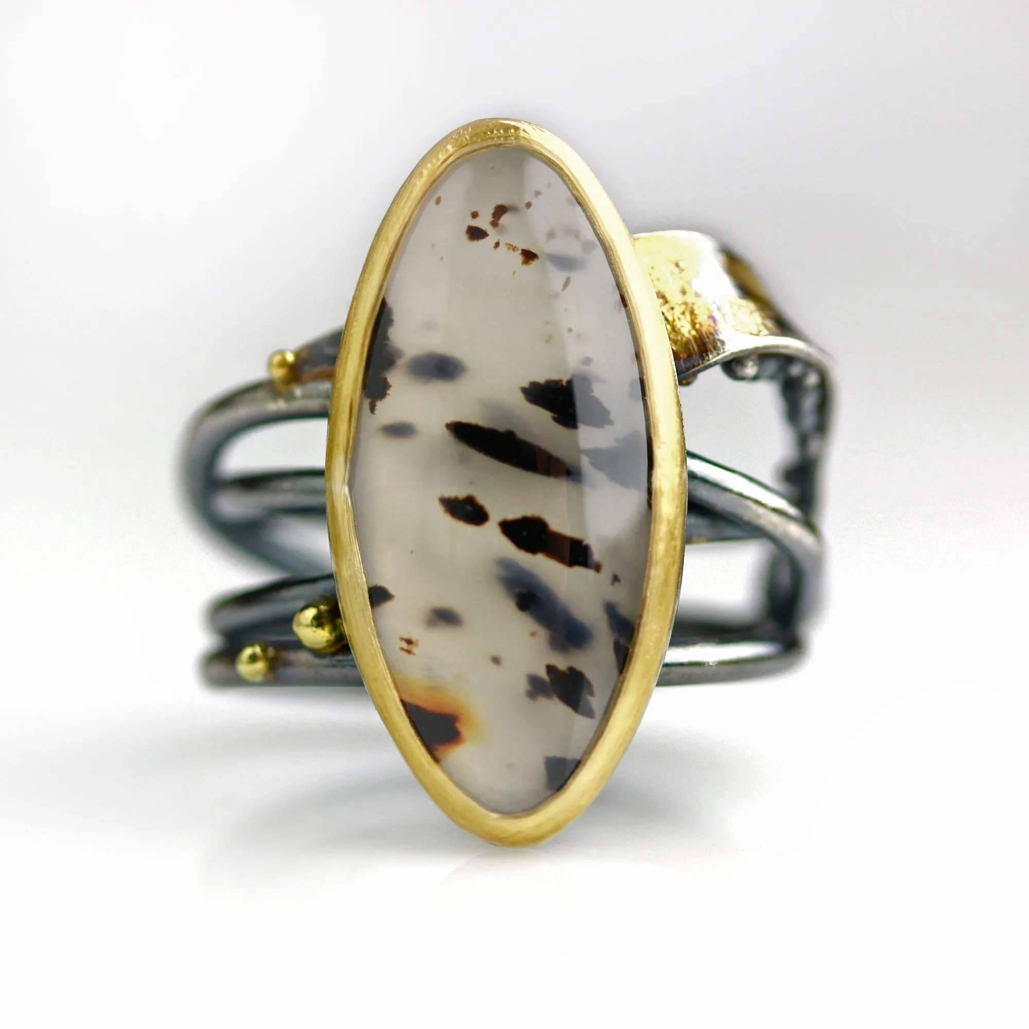 Sold! Montana Moss Agate on a Swirled Band. Size 7 1/4.