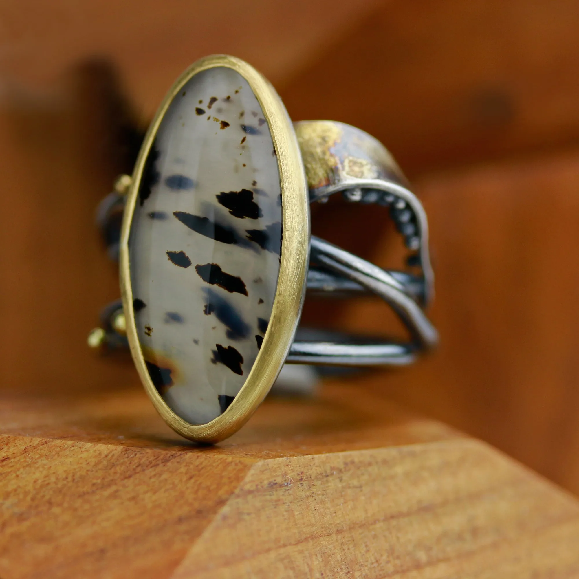 Sold! Montana Moss Agate on a Swirled Band. Size 7 1/4.