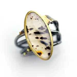 Sold! Montana Moss Agate on a Swirled Band. Size 7 1/4.