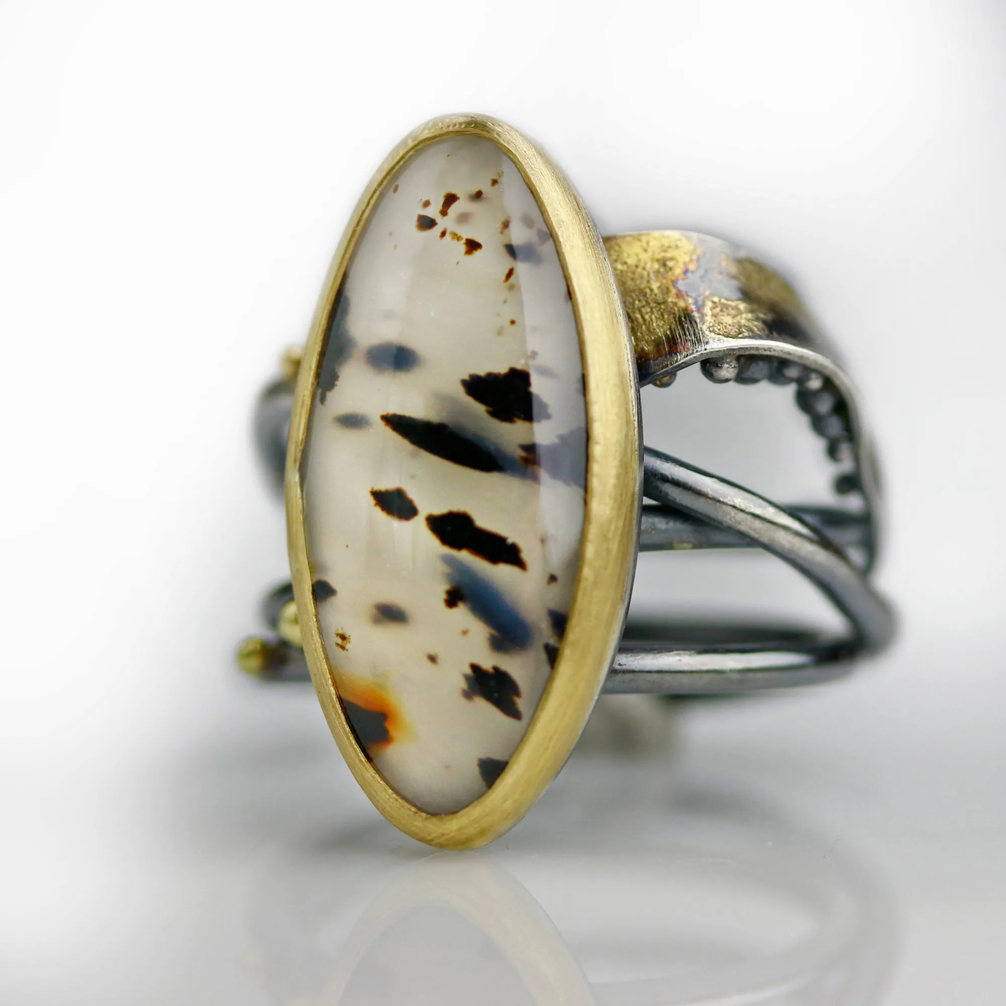 Sold! Montana Moss Agate on a Swirled Band. Size 7 1/4.