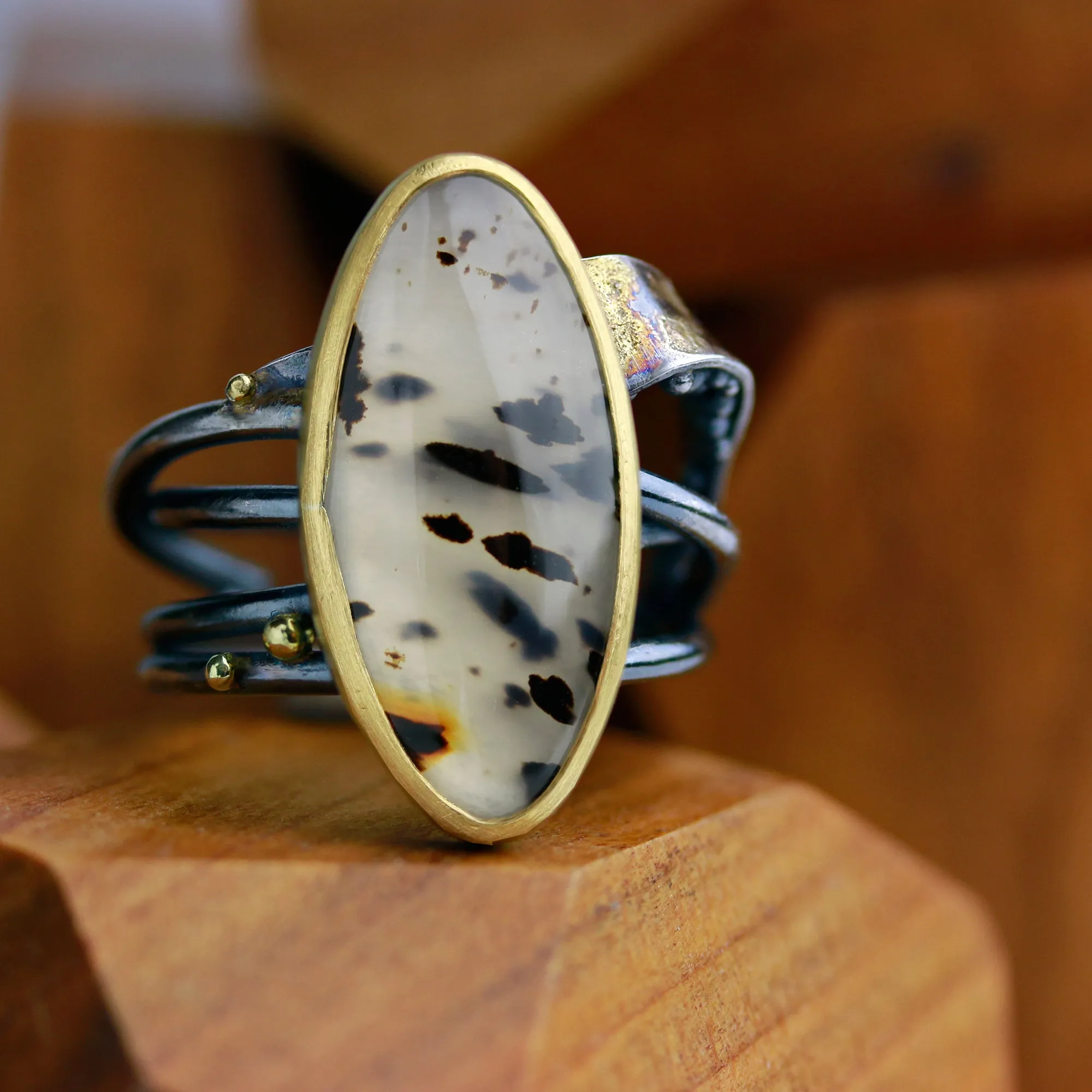 Sold! Montana Moss Agate on a Swirled Band. Size 7 1/4.