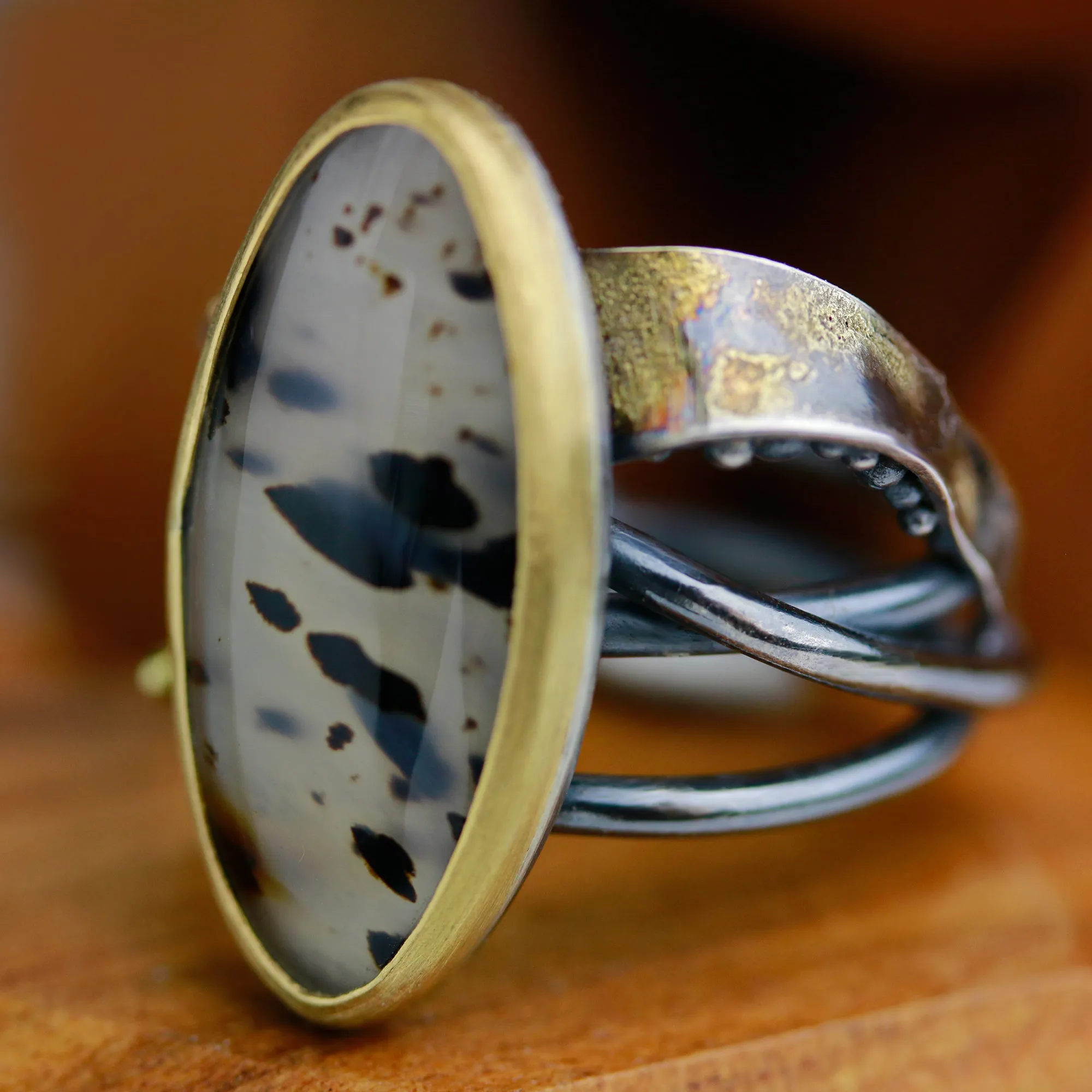 Sold! Montana Moss Agate on a Swirled Band. Size 7 1/4.