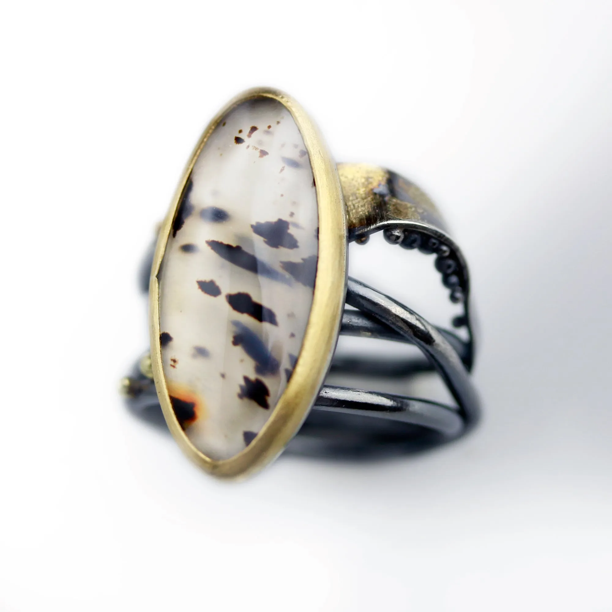Sold! Montana Moss Agate on a Swirled Band. Size 7 1/4.