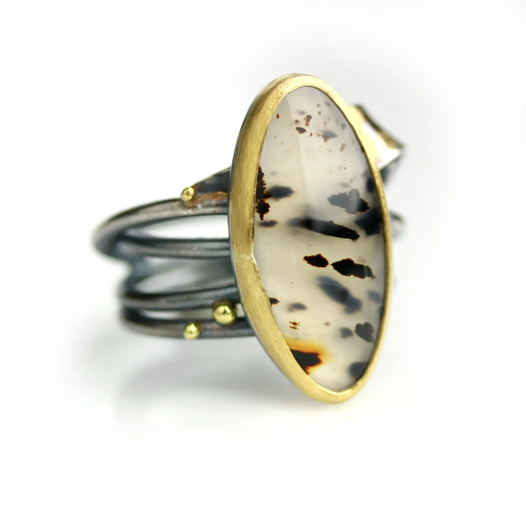 Sold! Montana Moss Agate on a Swirled Band. Size 7 1/4.