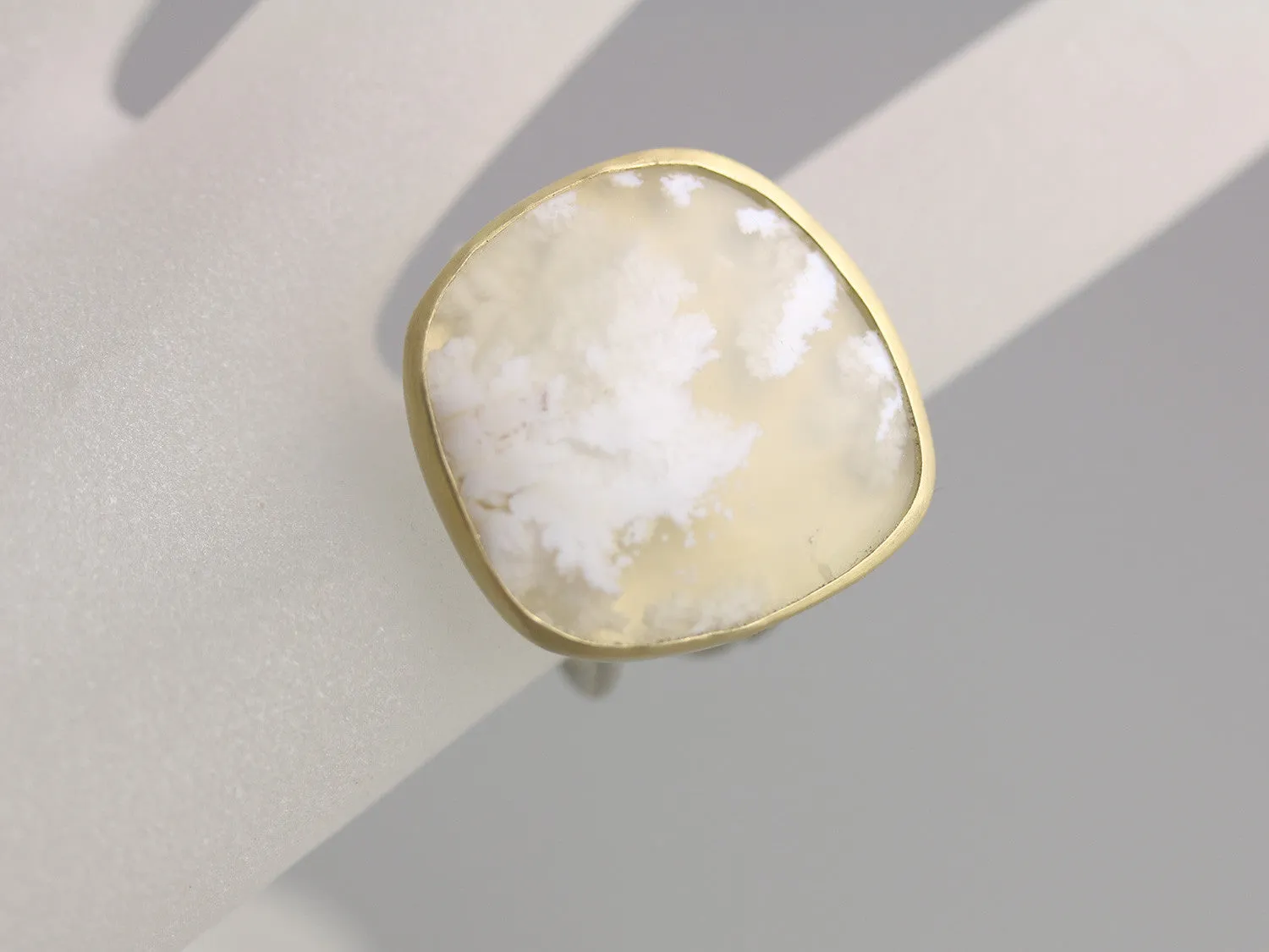 Sold! Snow in Summer . White Plume Agate Statement Ring on Swirled Band . 22k Gold and Silver . US size 7.5 .