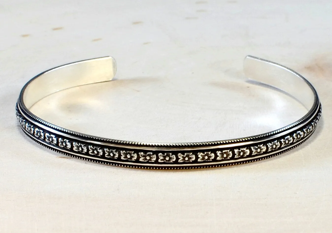 Sterling Silver Hibiscus Flower Patterned Bracelet with dark Patina