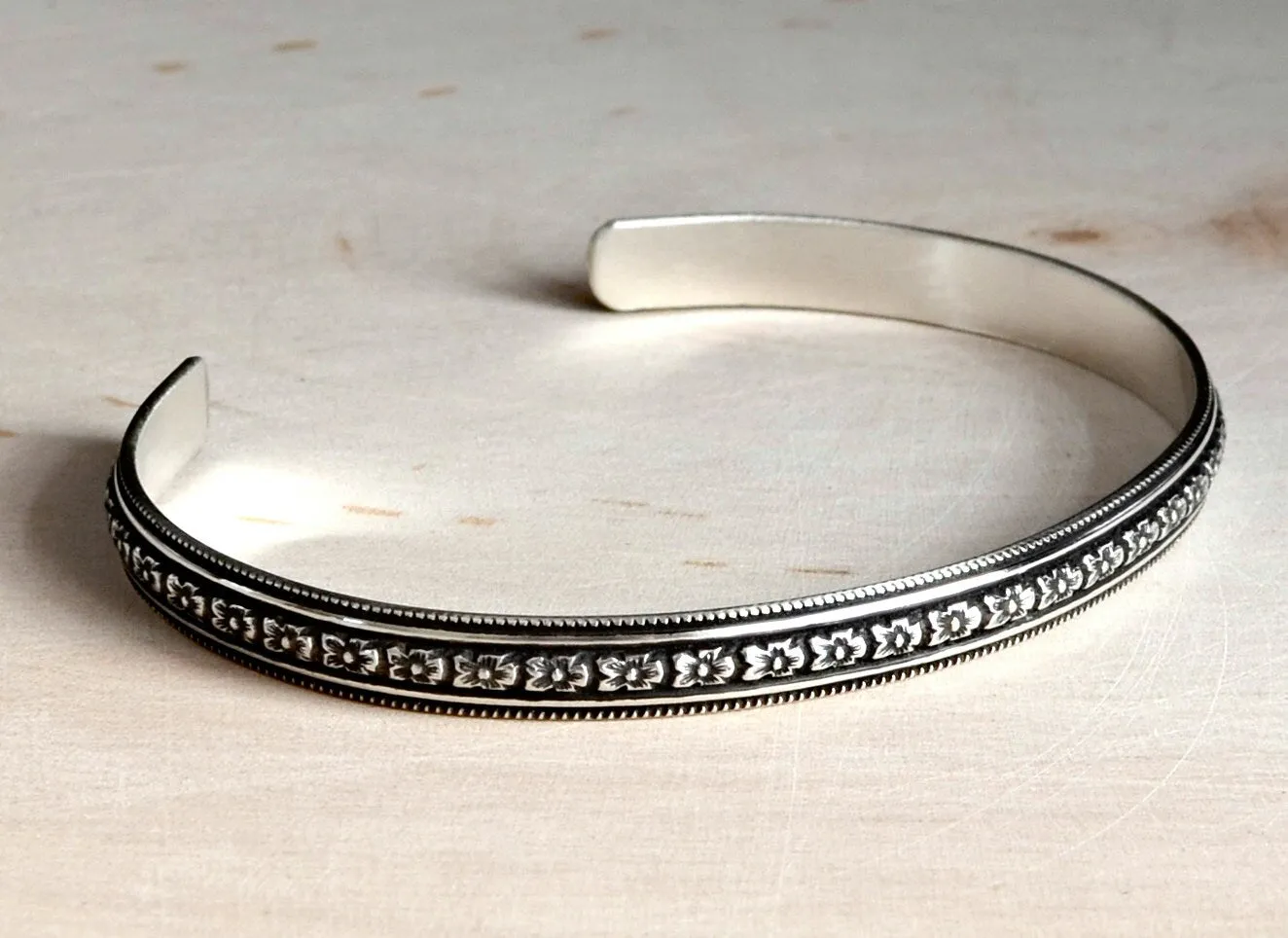 Sterling Silver Hibiscus Flower Patterned Bracelet with dark Patina