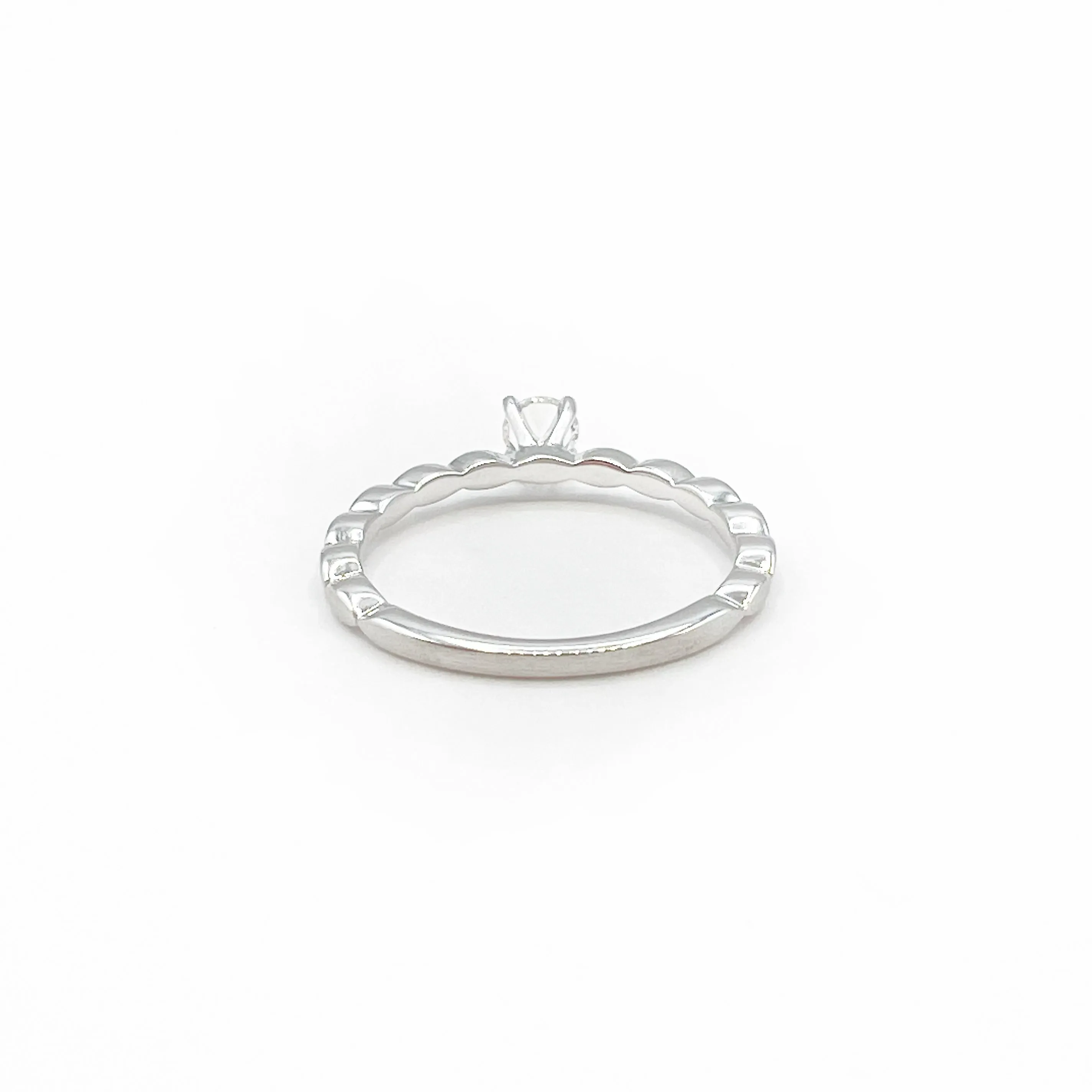 White Sapphire set in 14 Karat White Gold