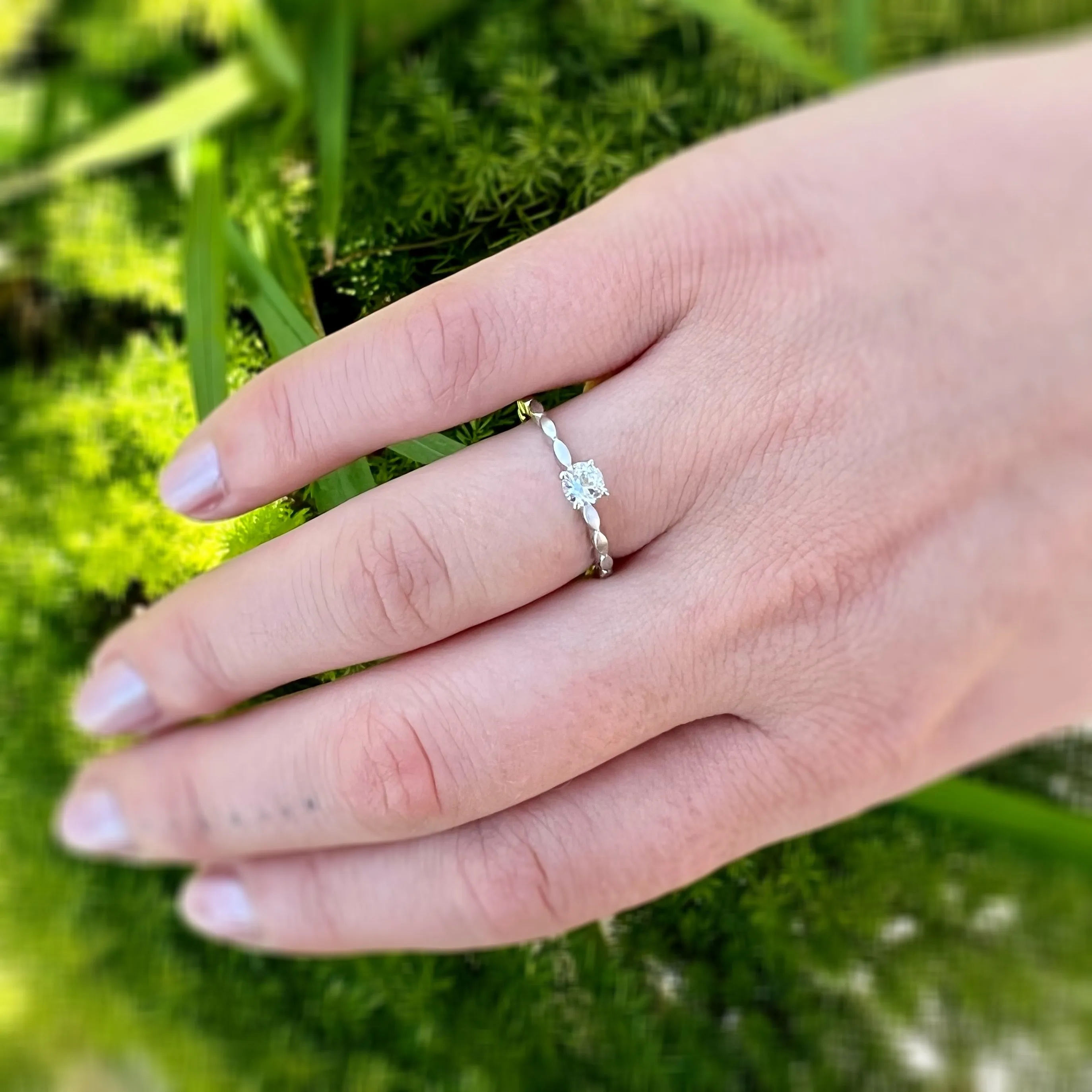 White Sapphire set in 14 Karat White Gold