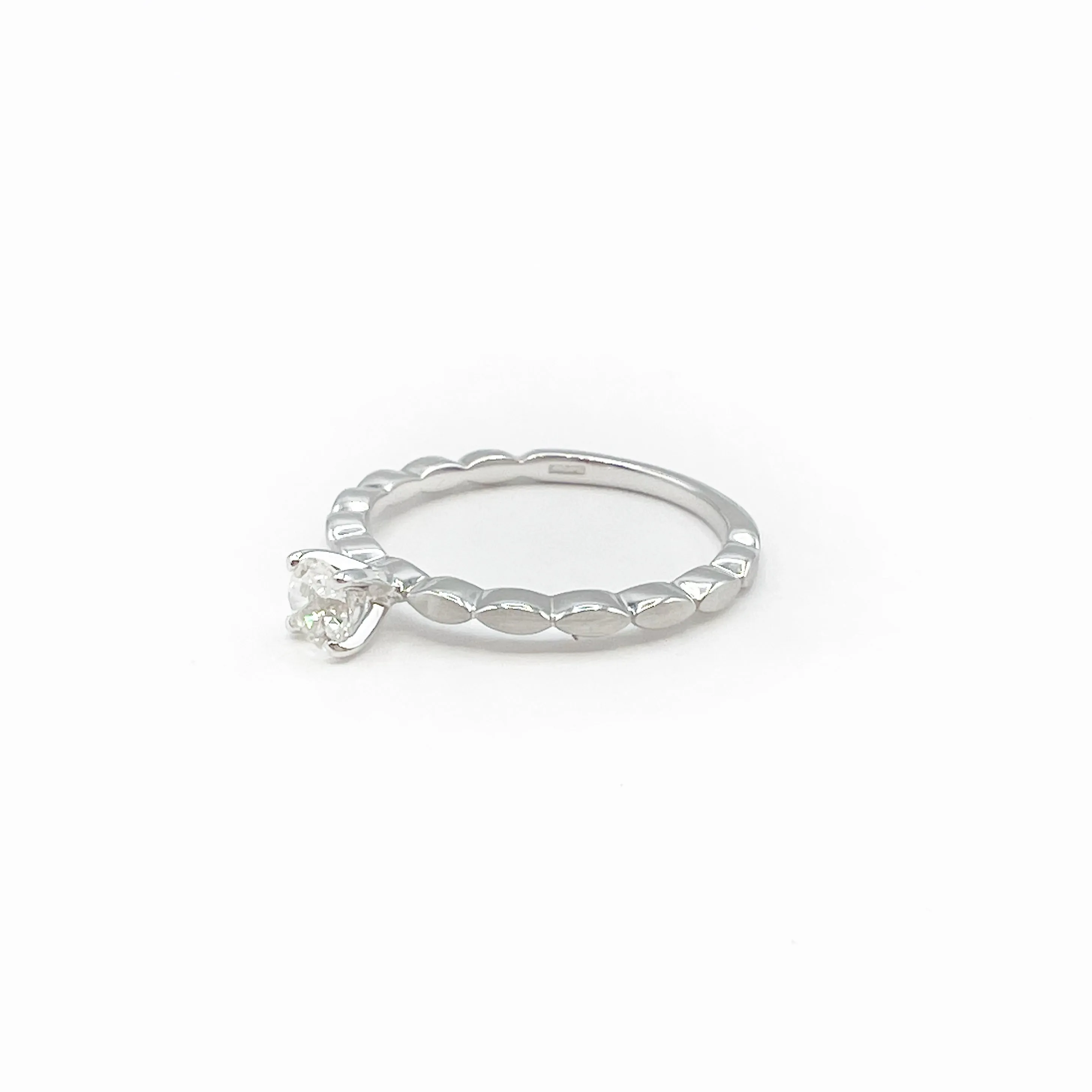 White Sapphire set in 14 Karat White Gold